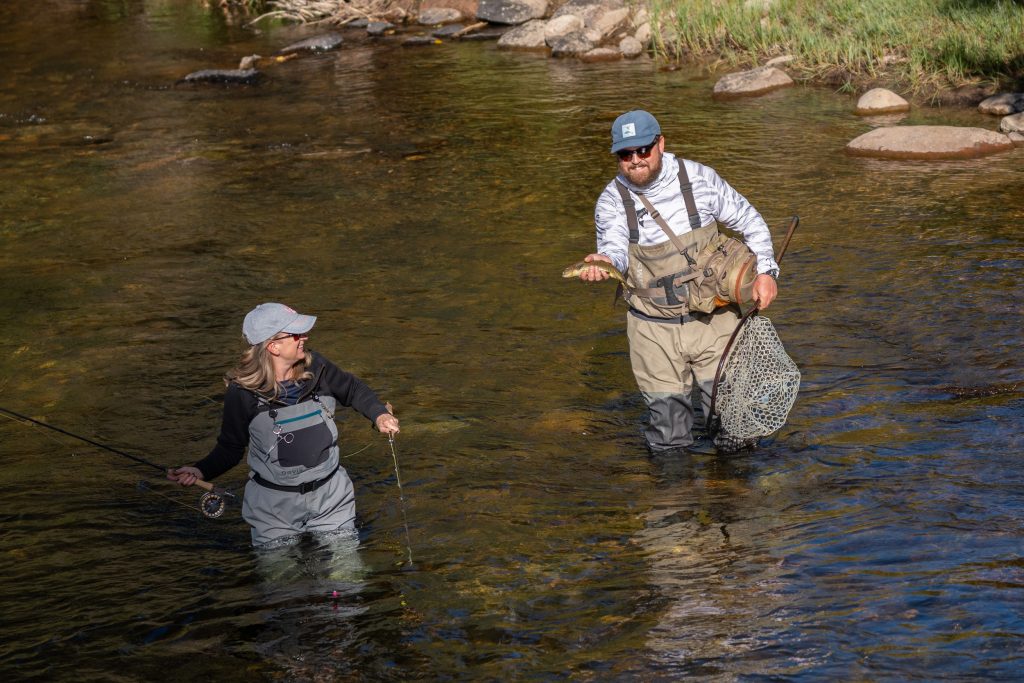 Guided fly fishing with trout catch on Taylor River