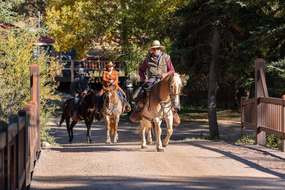 Horseback riders at Taylor River bridge