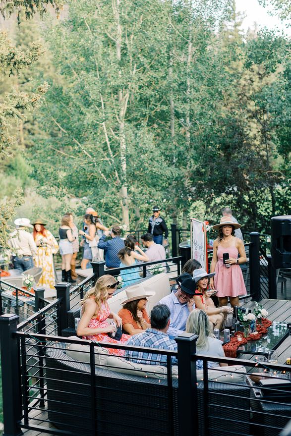Guests at a welcome party on the deck